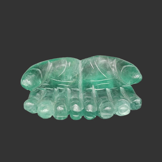This is the front view of this hand carved and polished green fluorite palm of hands bowl.