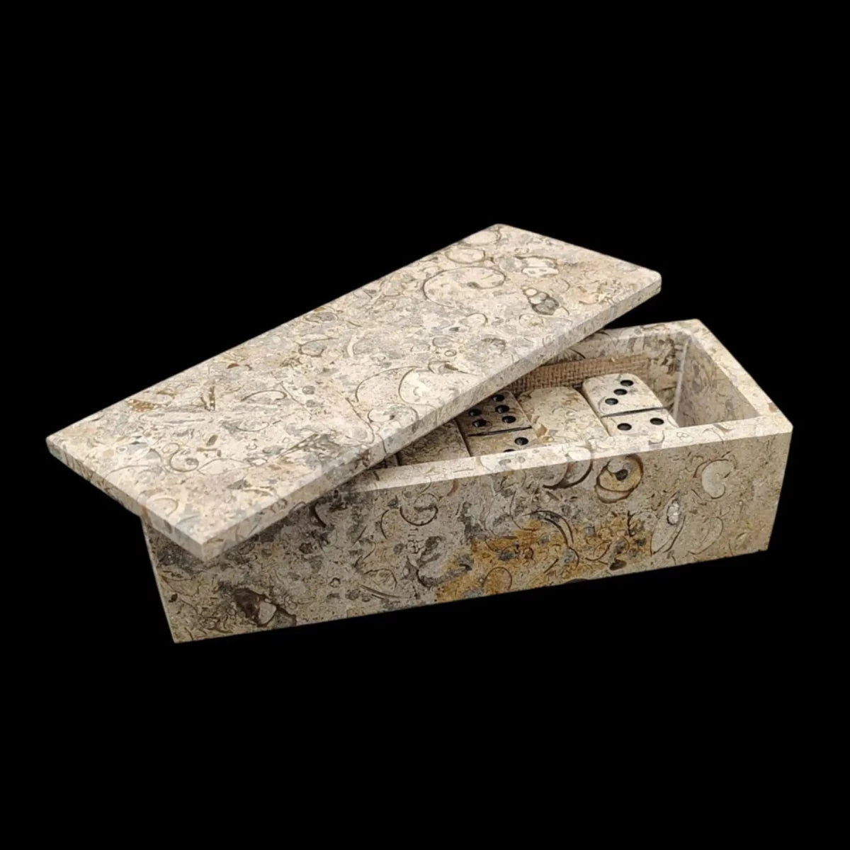 The lid on this fossil Onyx domino case opens from the top.