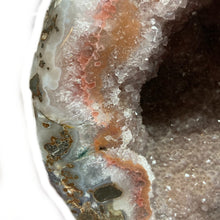 Load image into Gallery viewer, Close Up Of The Outer Edge Of Drusy Geode On Metal Stand, Polished White, Pink And Earth Tone Agate And Drusy Crystals
