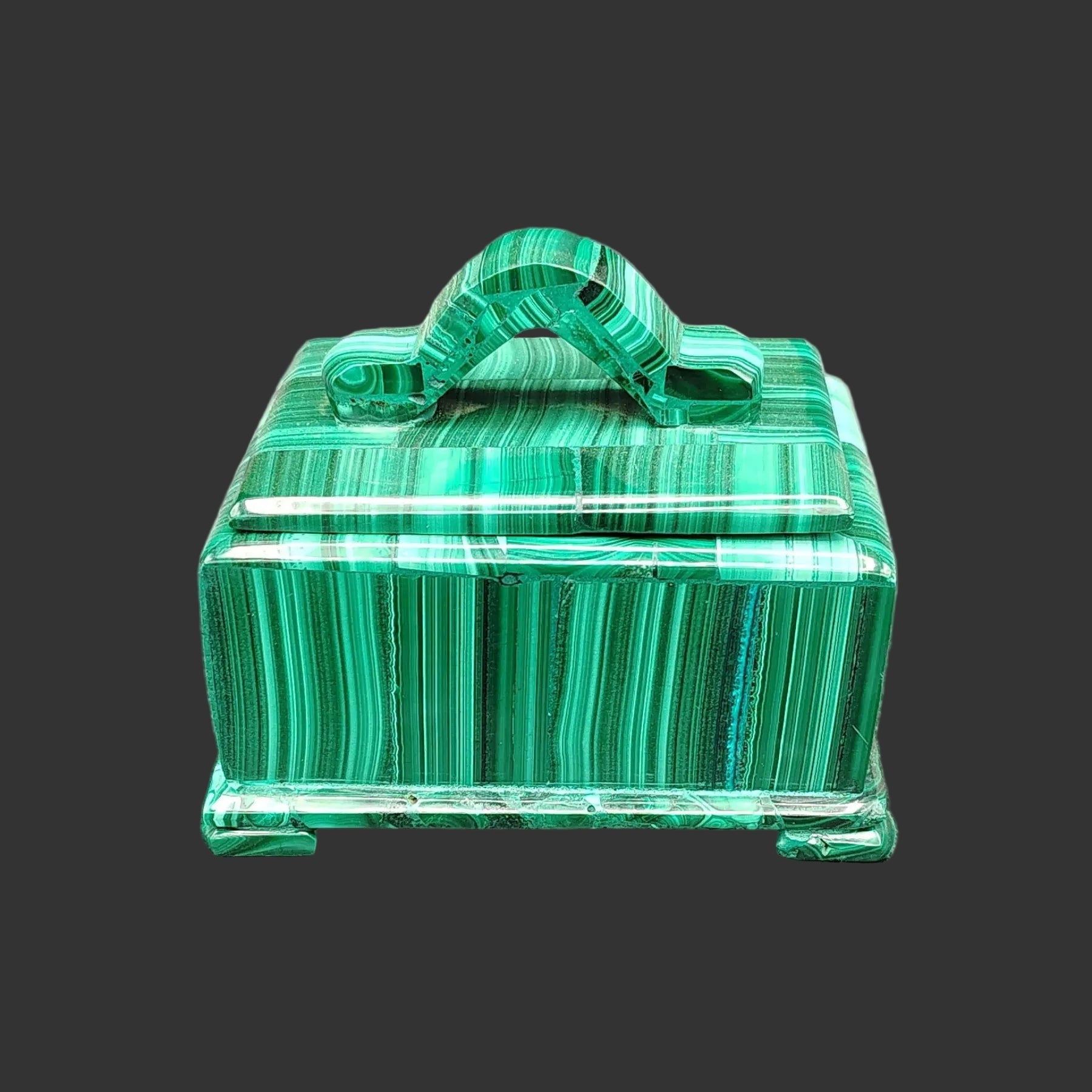 This is the front view of this polished handmade green malachite trinket box.
