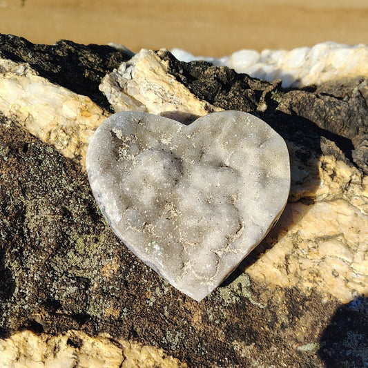 Amethyst heart outside in natural light