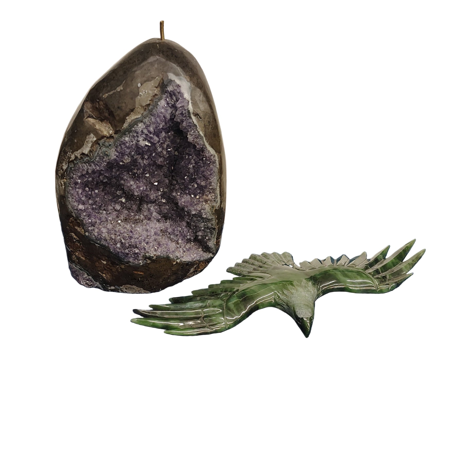 The jade eagle sits on a metal peg, it is removal for easy storage or cleaning