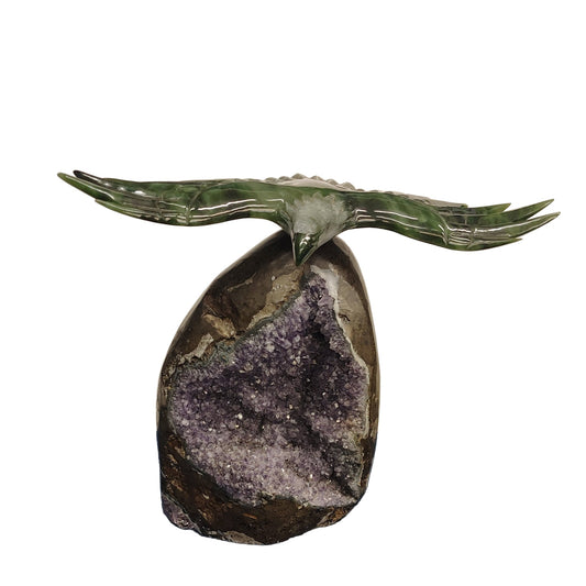 This is the front view of this jade eagle on a amethyst geode stand