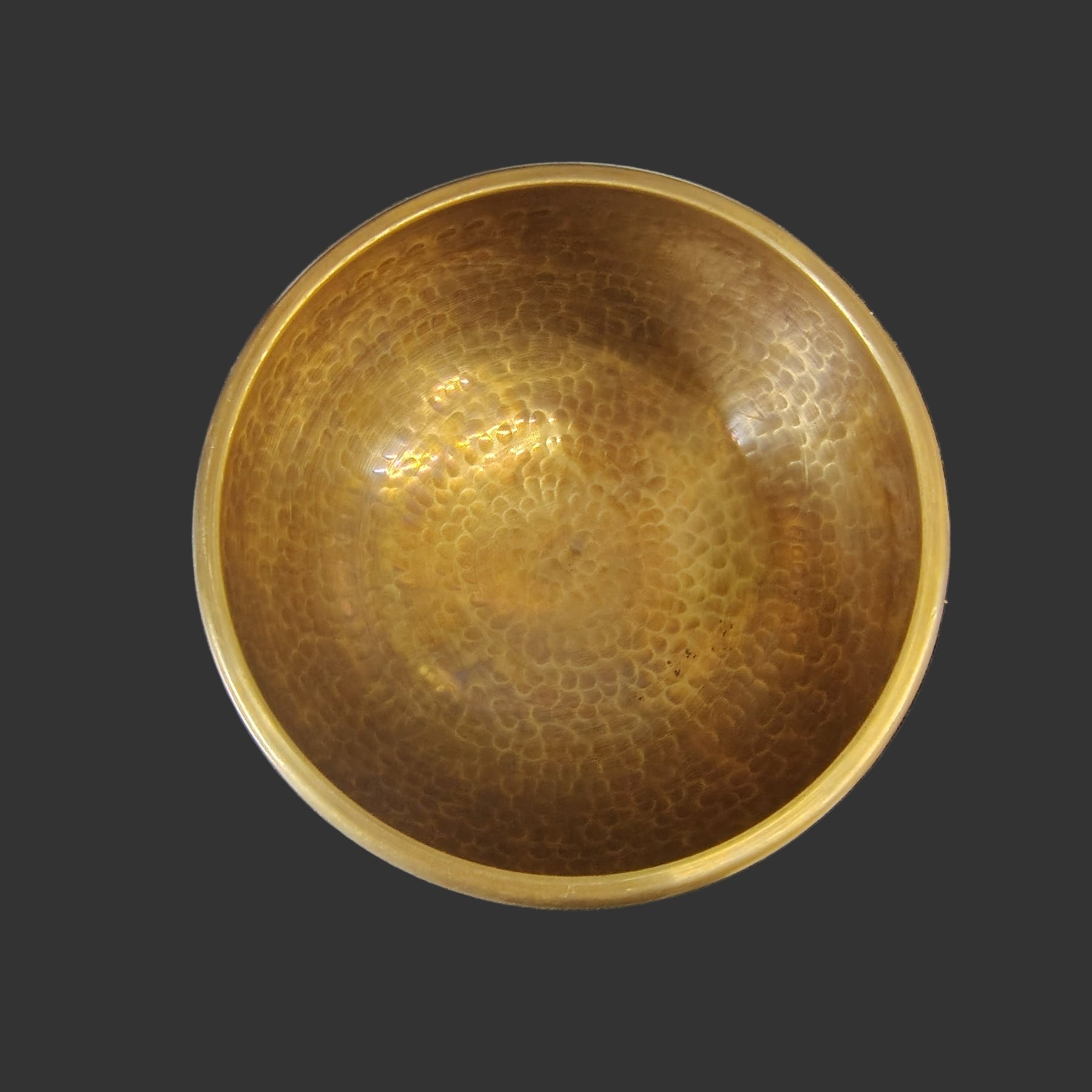 This is what the inside view of the bowl looks like, smooth and hammered metal.