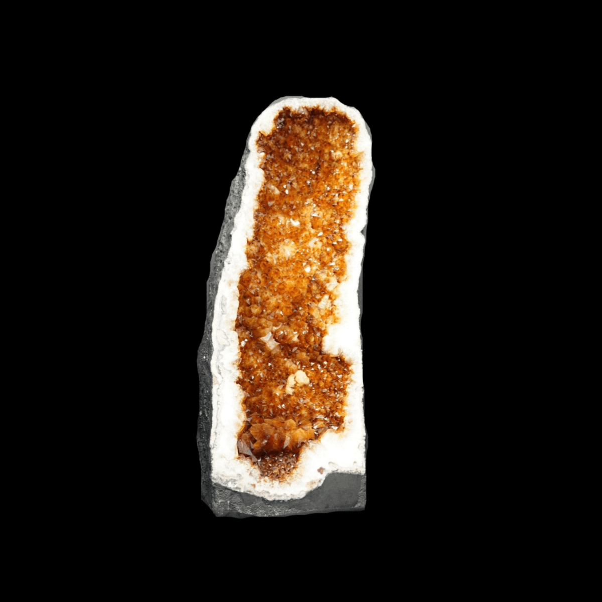 Mineral sample with brown and white coloration on a black background