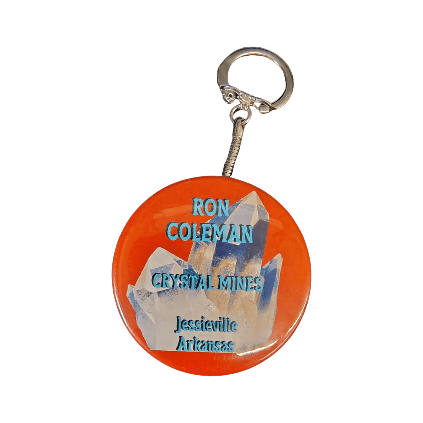This is the front side of this orange Ron Coleman mining keychain.