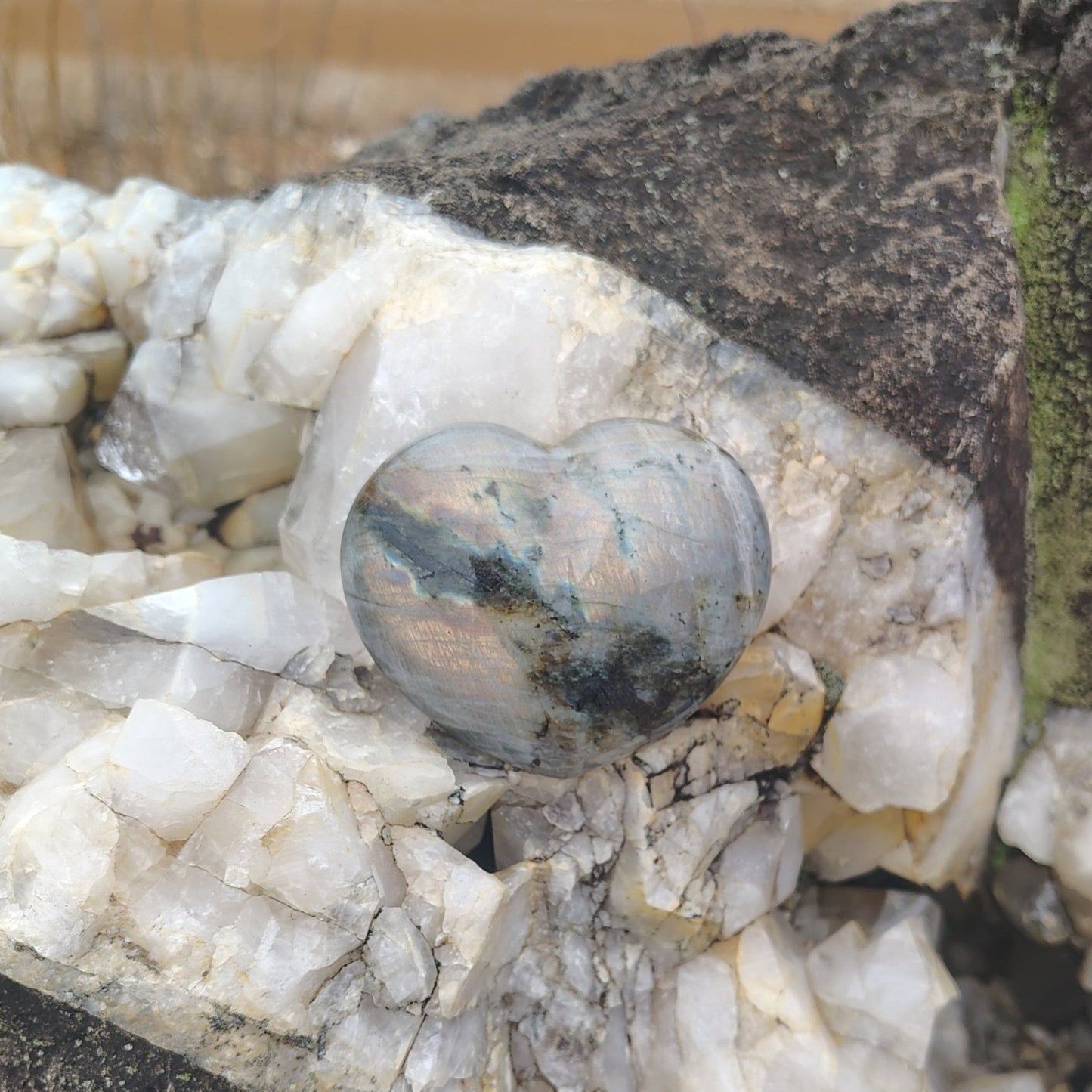 This is the front side of this polished Labradorite heart