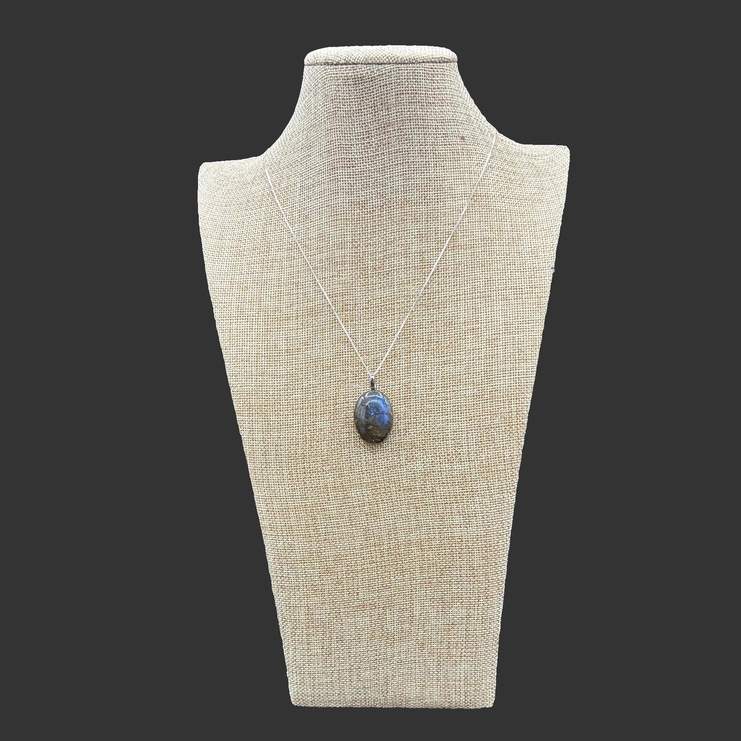 Sterling Silver box chain with Labradorite pendant, on a necklace stand.