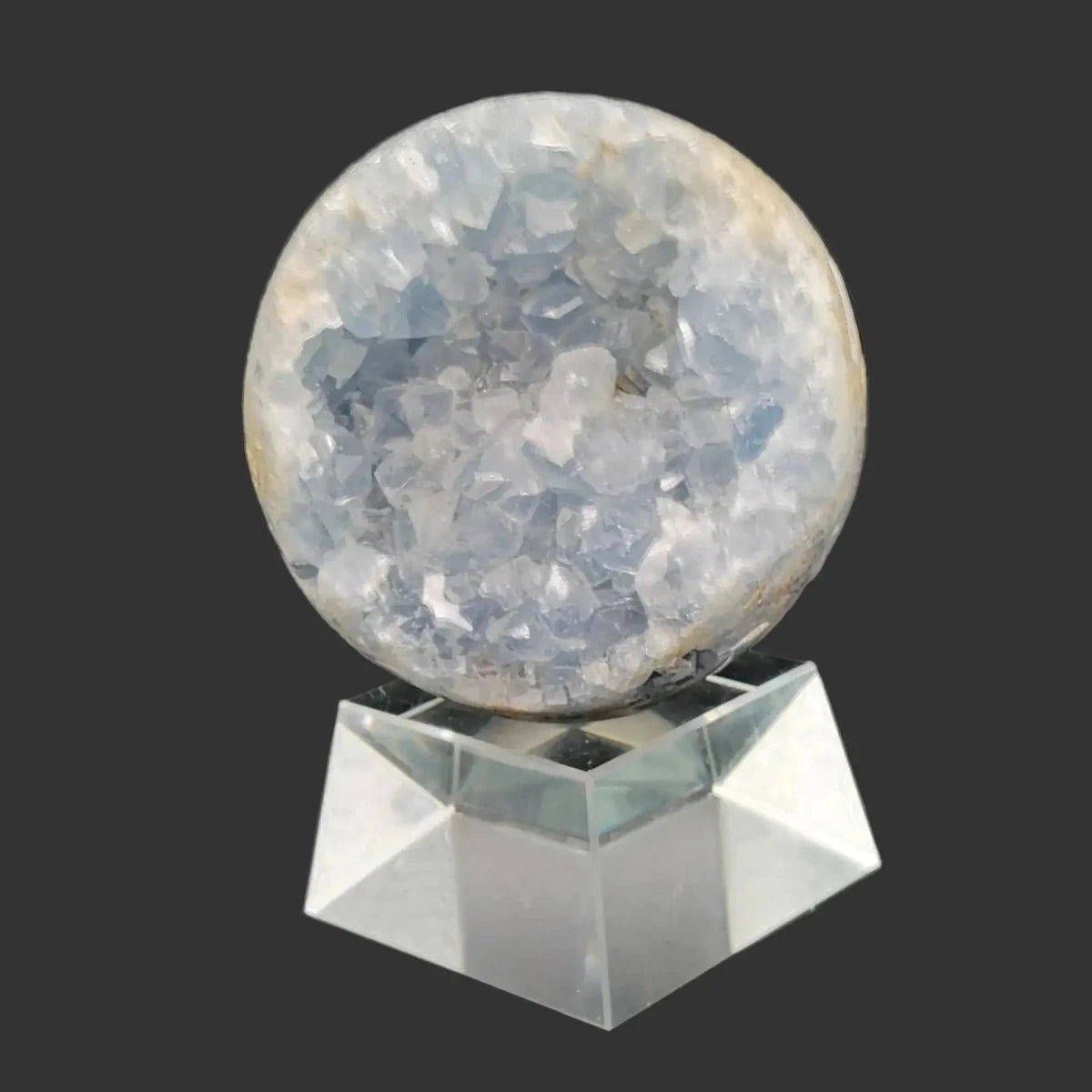 This is the front side of this large blue Celestite sphere, its covered in crystals.