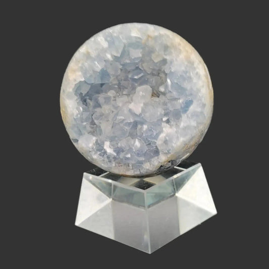 This is the front side of this large blue Celestite sphere, its covered in crystals.