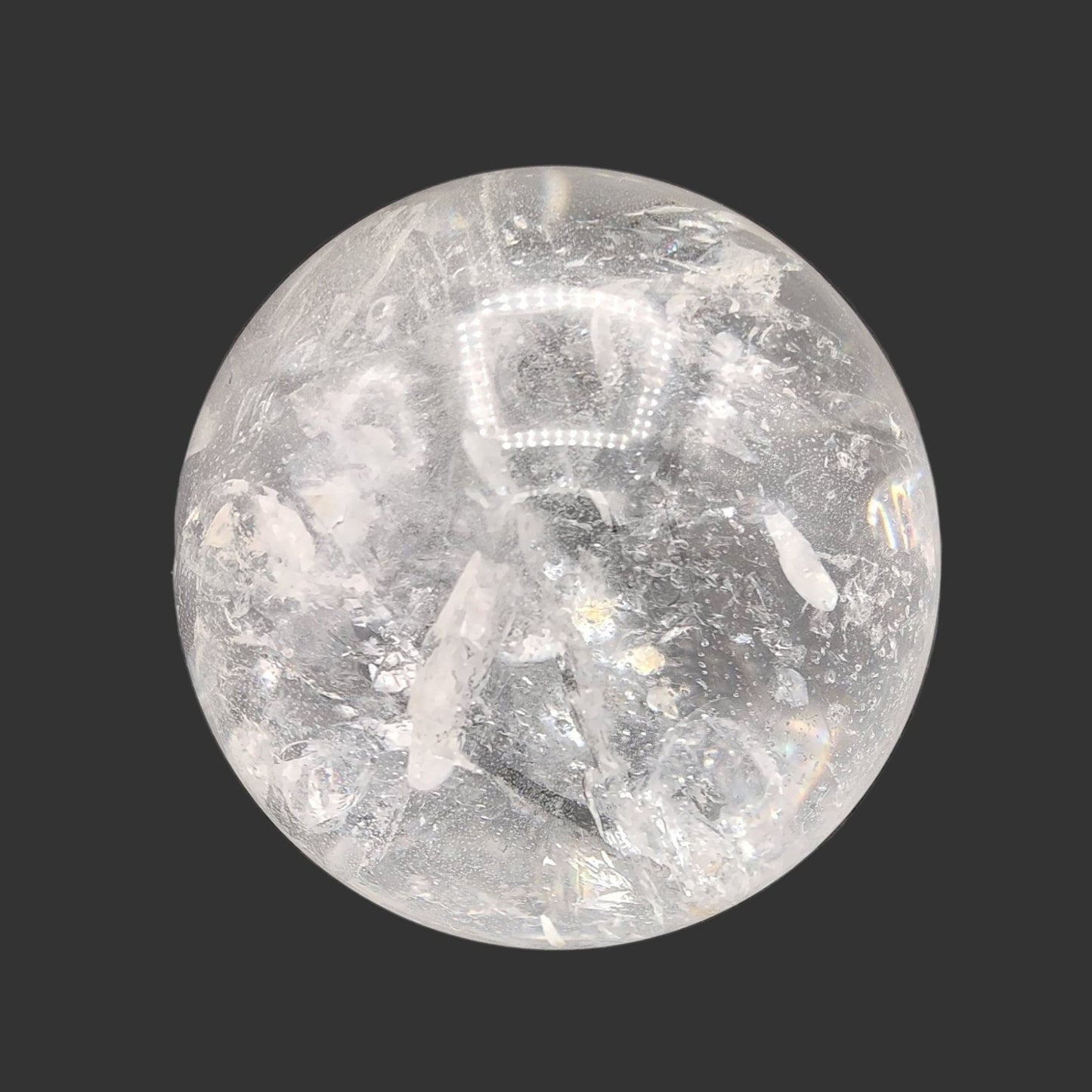 This is the left side of this polished quartz crystal sphere.