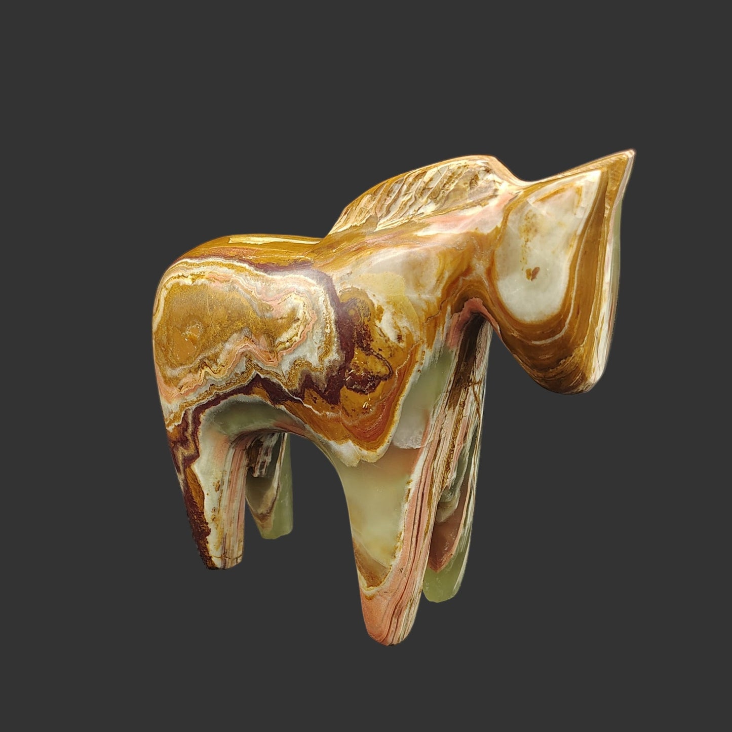 This is the right side of this polished Onyx horse