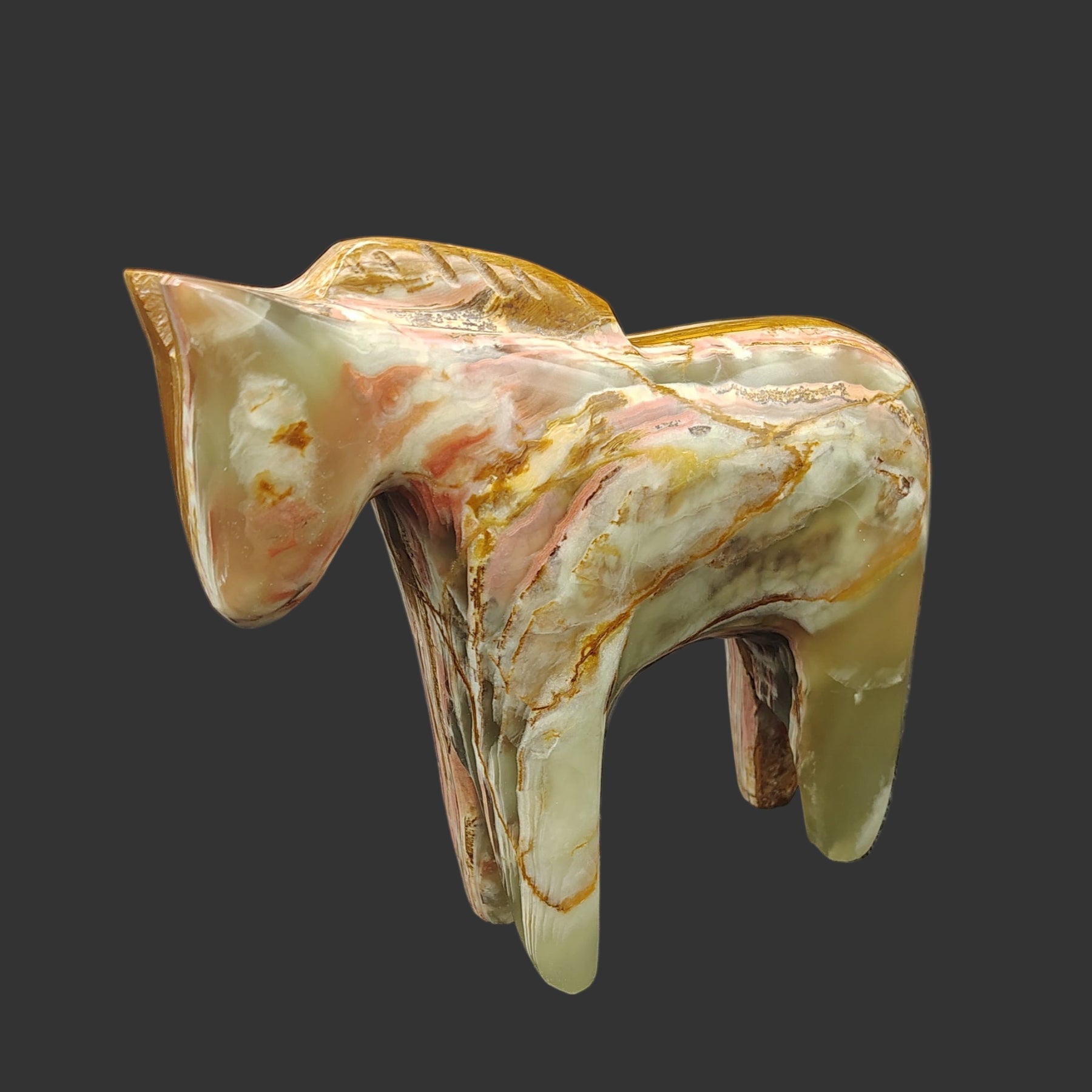 This is the left side of this polished Onyx horse
