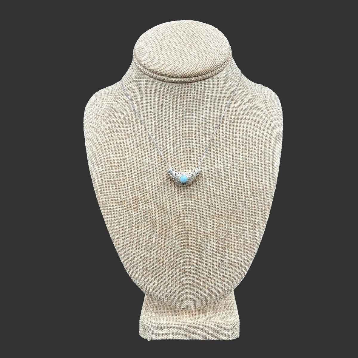 Sterling Silver and ornate Larimar necklace.