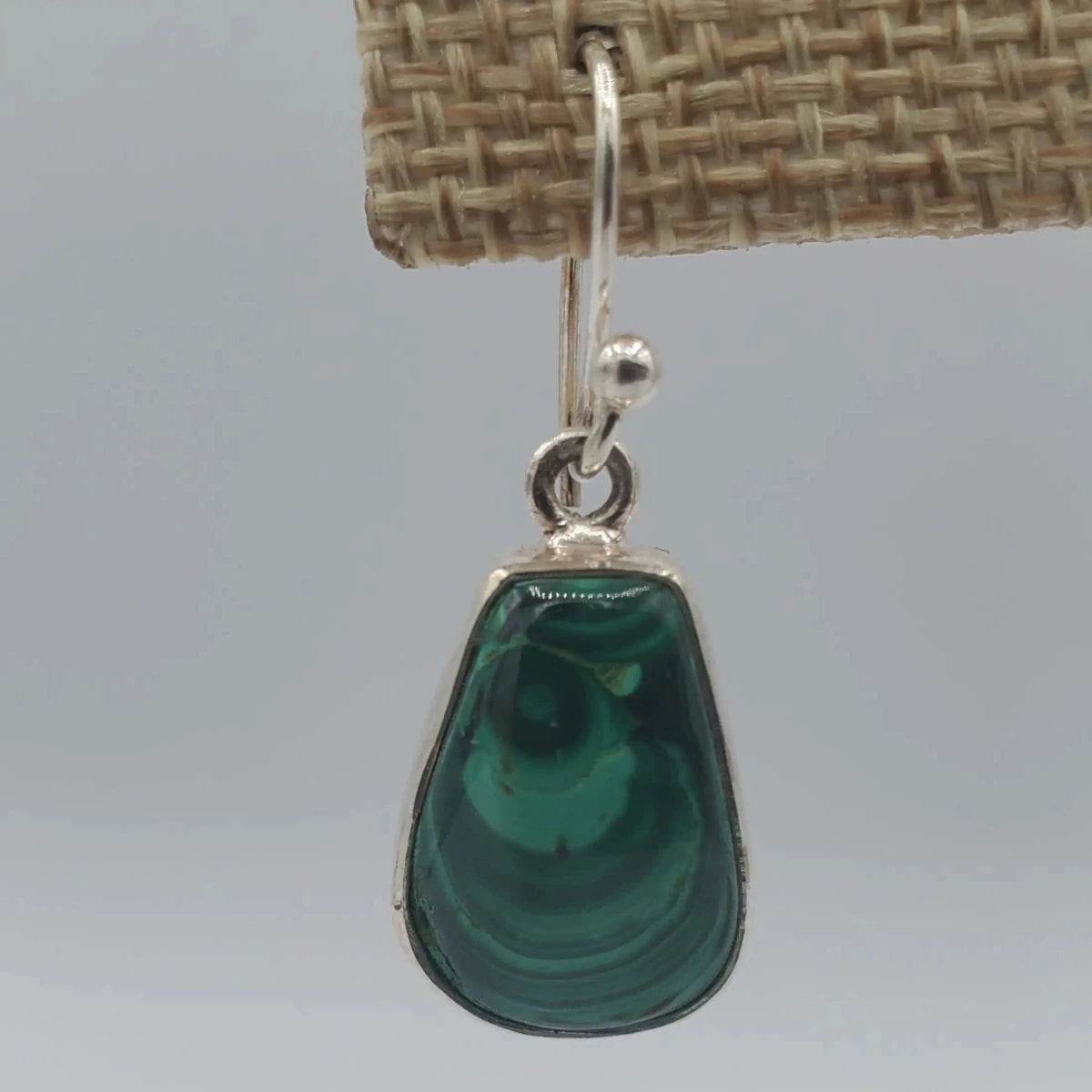 Close Up Of Malachite Silver Dangle Earrings