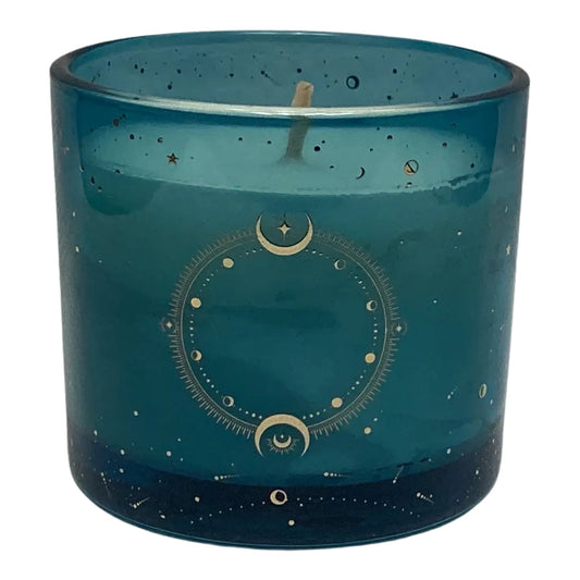Blue candle with celestial design on a white background