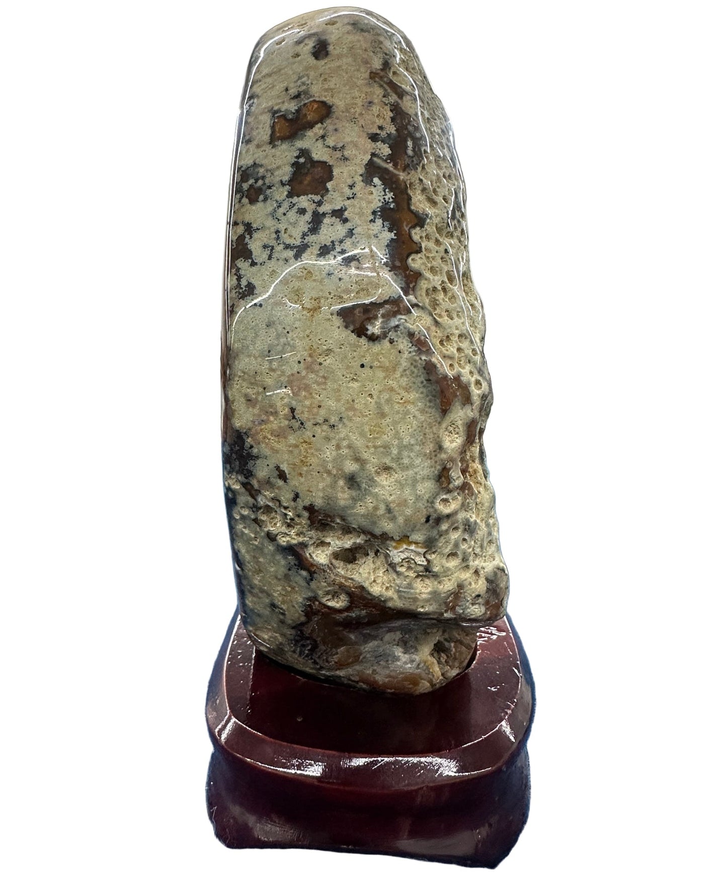 Decorative stone on a wooden stand 