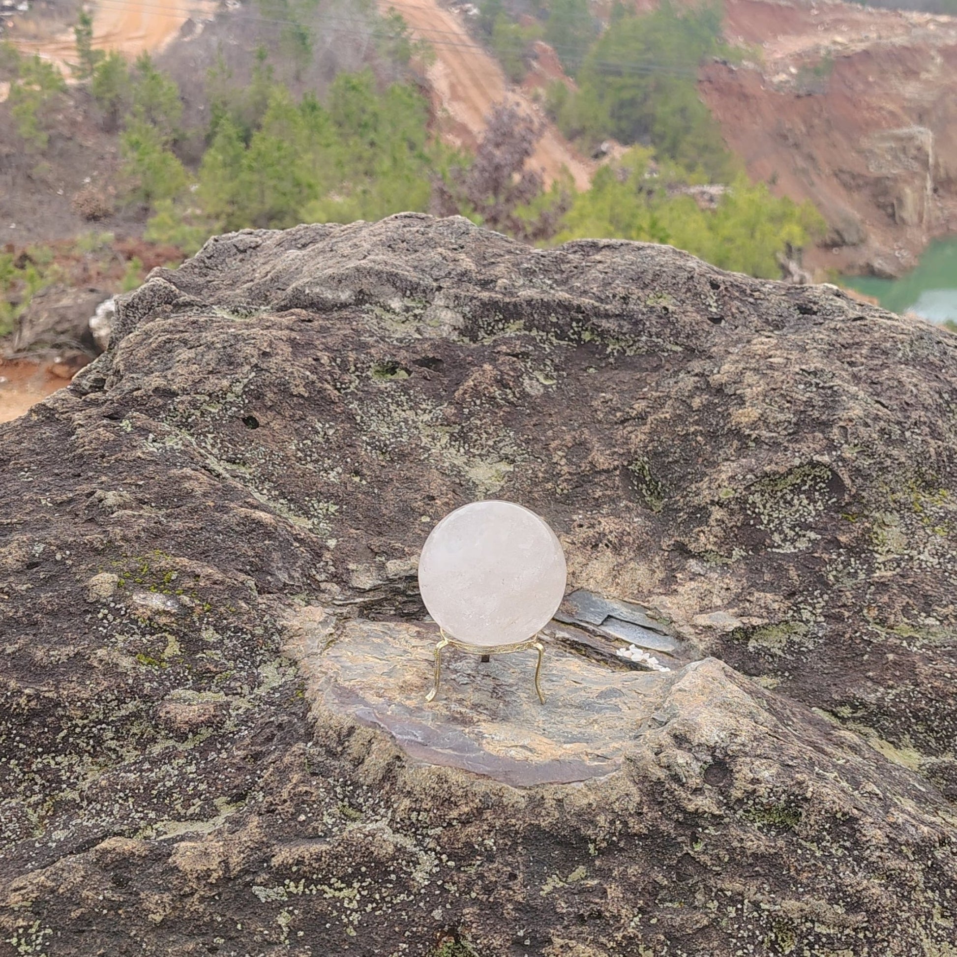 This is the back side of this Quartz crystal sphere in natural light