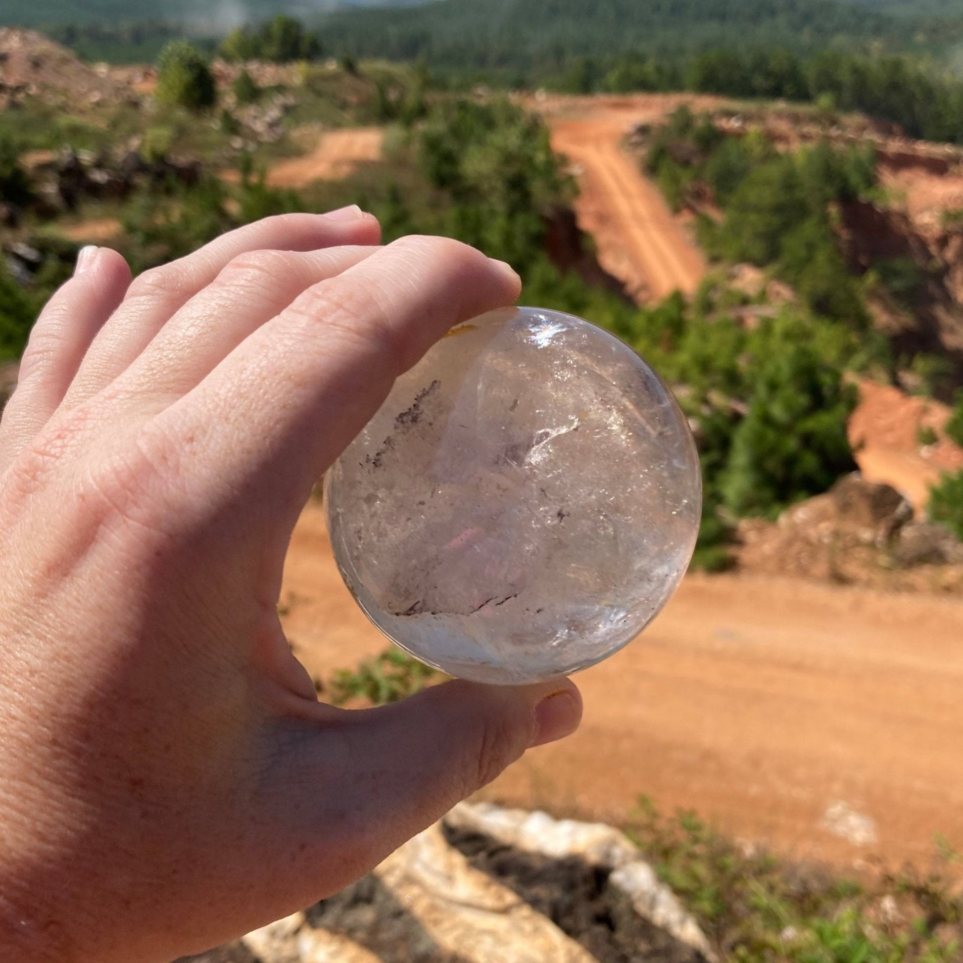 Quartz crystal sphere in natural light.