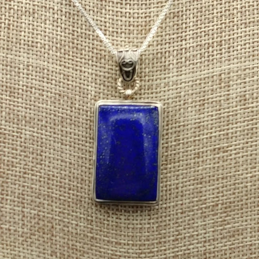 Close up of the rectangular Sterling Silver and blue Lapis Lazuli pendant.