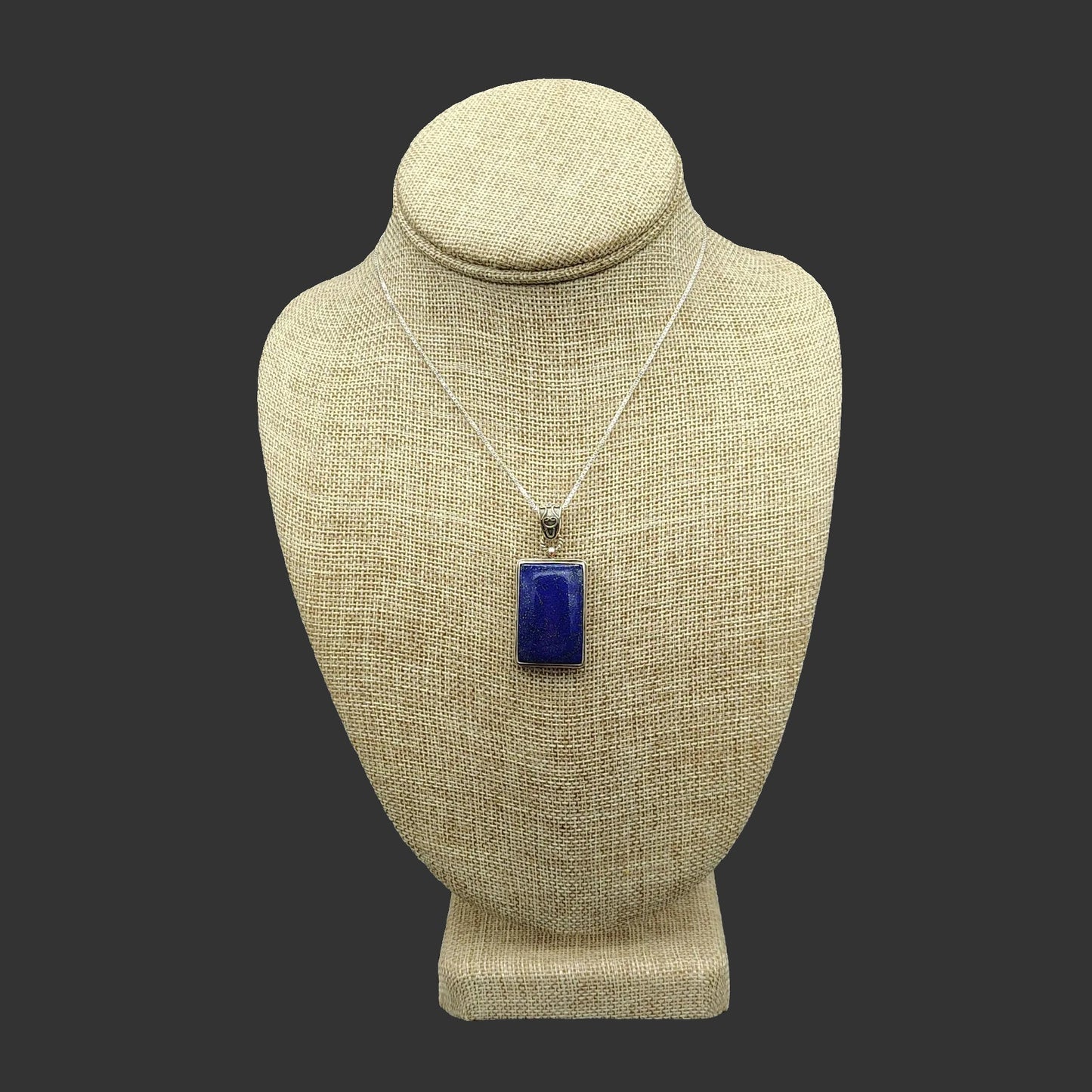 Front view of this adjustable Sterling Silver box chain and rectangular Lapis Lazuli pendant.