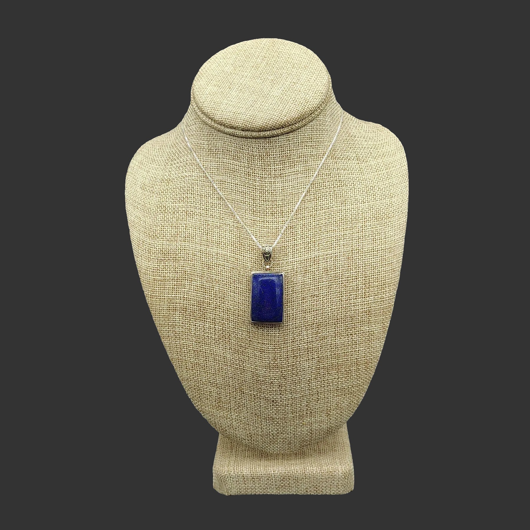 Front view of this adjustable Sterling Silver box chain and rectangular Lapis Lazuli pendant.