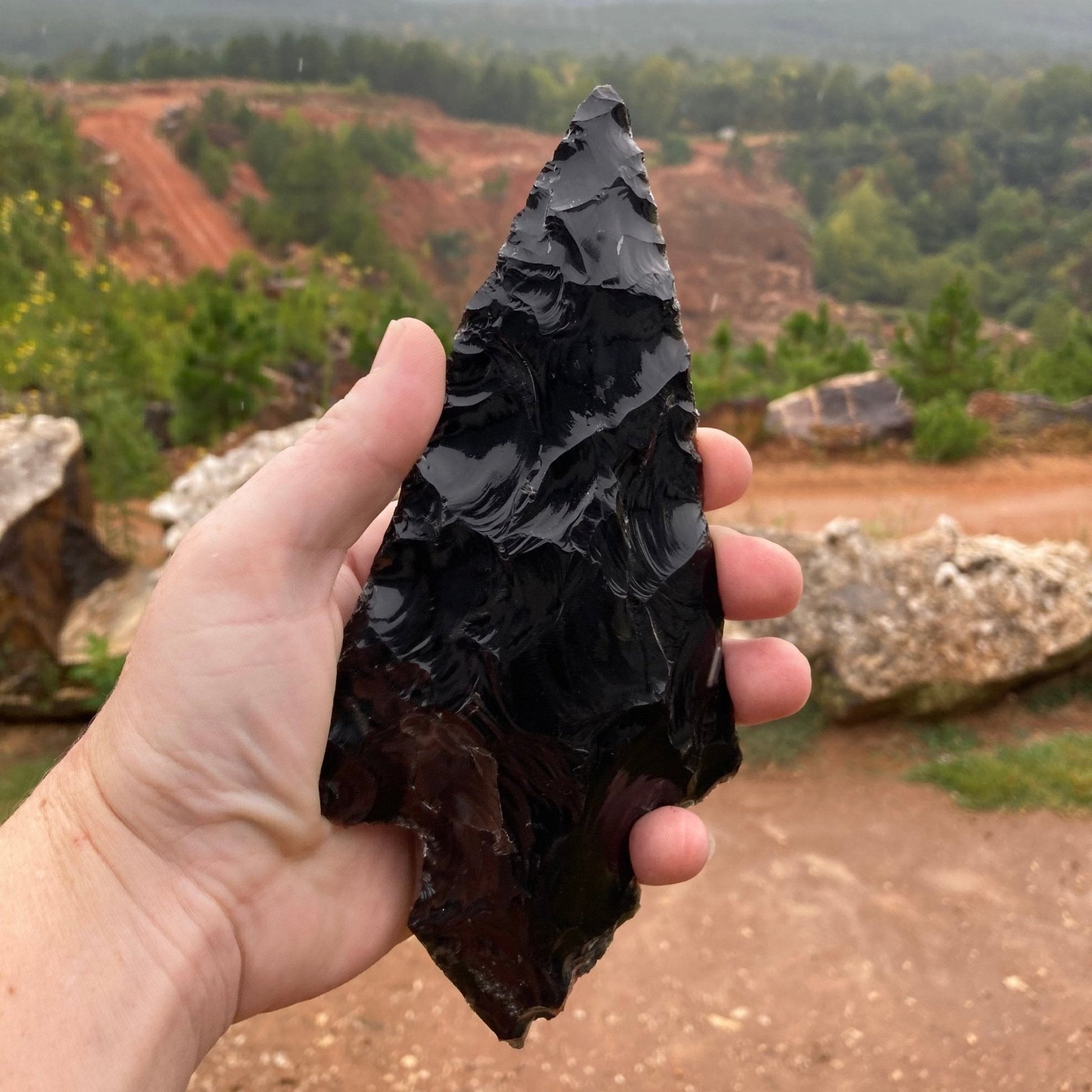 Handmade Obsidian arrowhead in natural light