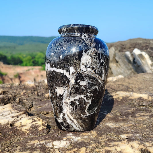 This is the black and white onyx vase in natural outdoor light