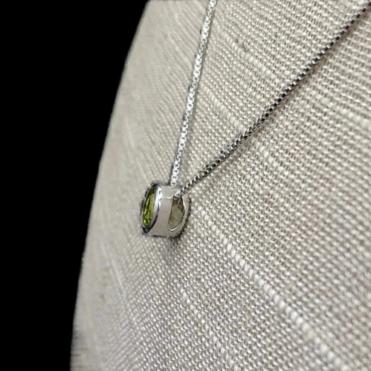 This is the side profile of the Sterling Silver Peridot pendant