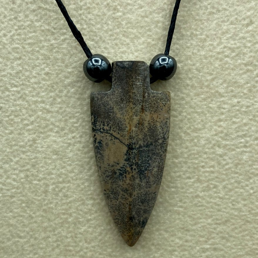 Close Up Of Arrowhead Pendant