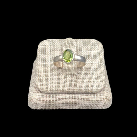 Front View Of Peridot Ring Sterling Oval Cut Size 8 August Birthstone, Gemstone Is A Greenish Yellow