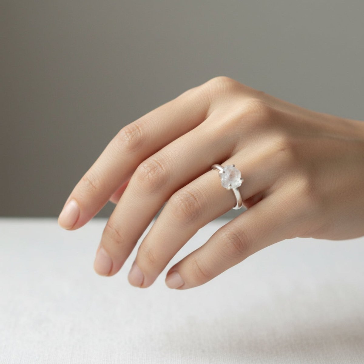 Sterling Silver and Herkimer diamond ring on a woman's ring finger.