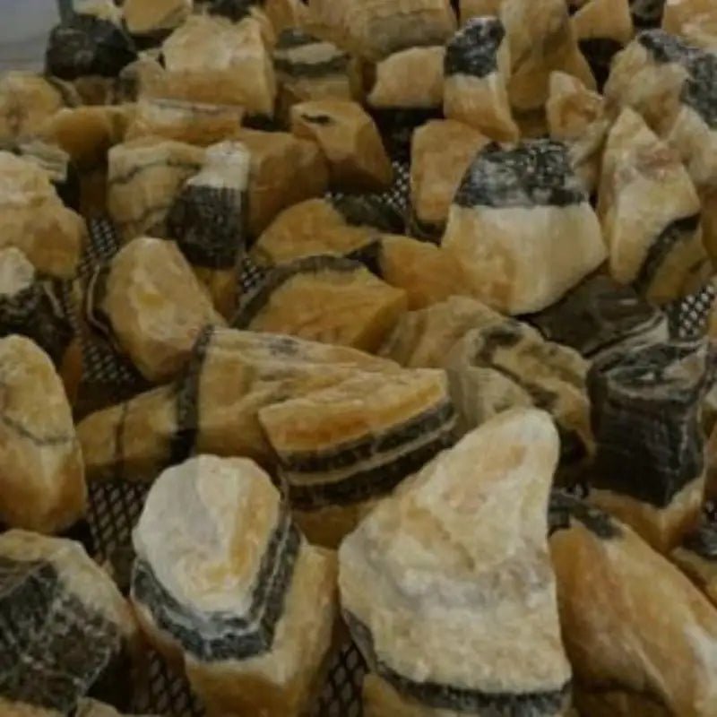 Zebra Calcite Rock also known as Phanton Calcite On A Table