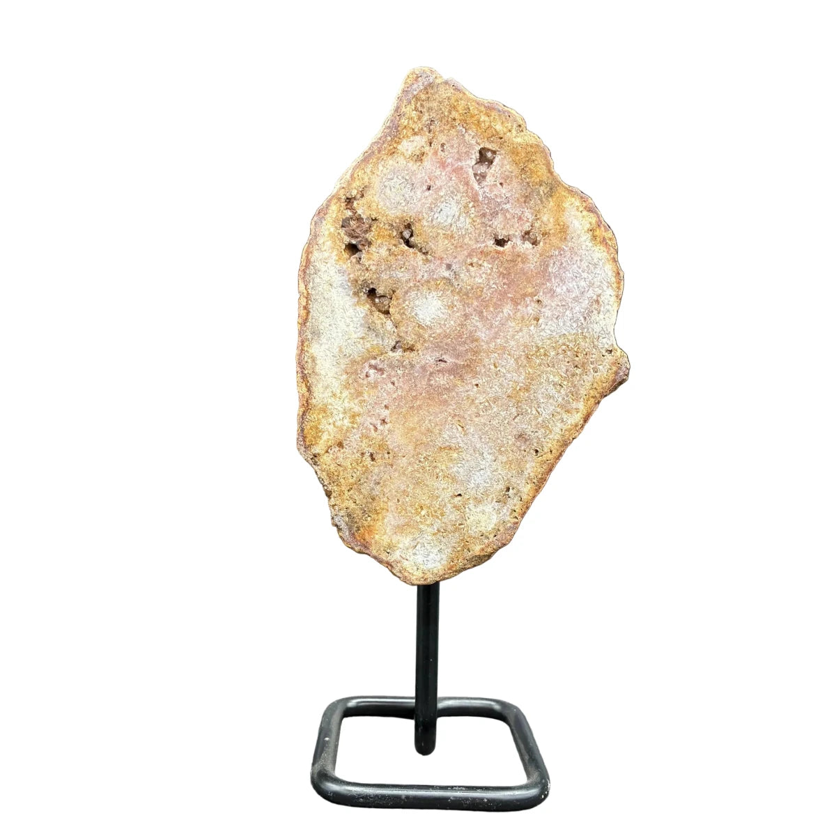 Front side of this pink amethyst on a stand and in front of a white background.