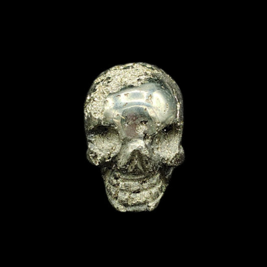 This is the front side of this polished Pyrite skull figurine