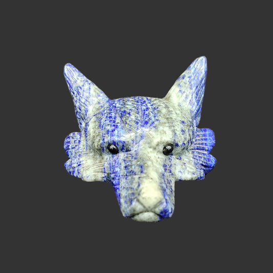 This is the front side of this lapis lazuli wolf head figurine