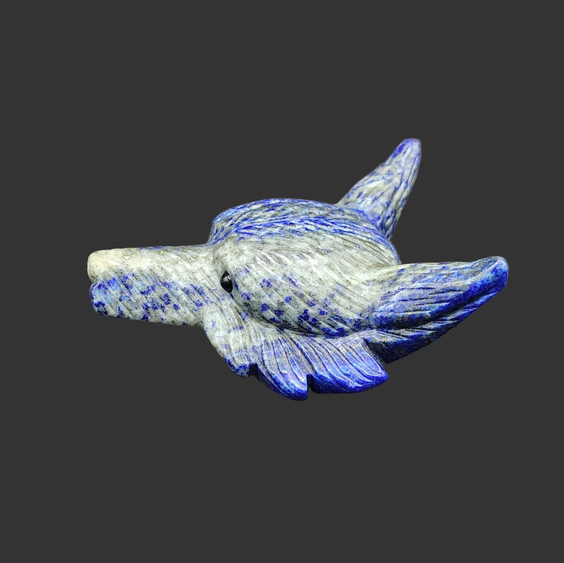 This is the left side of this lapis lazuli wolf head figurine 