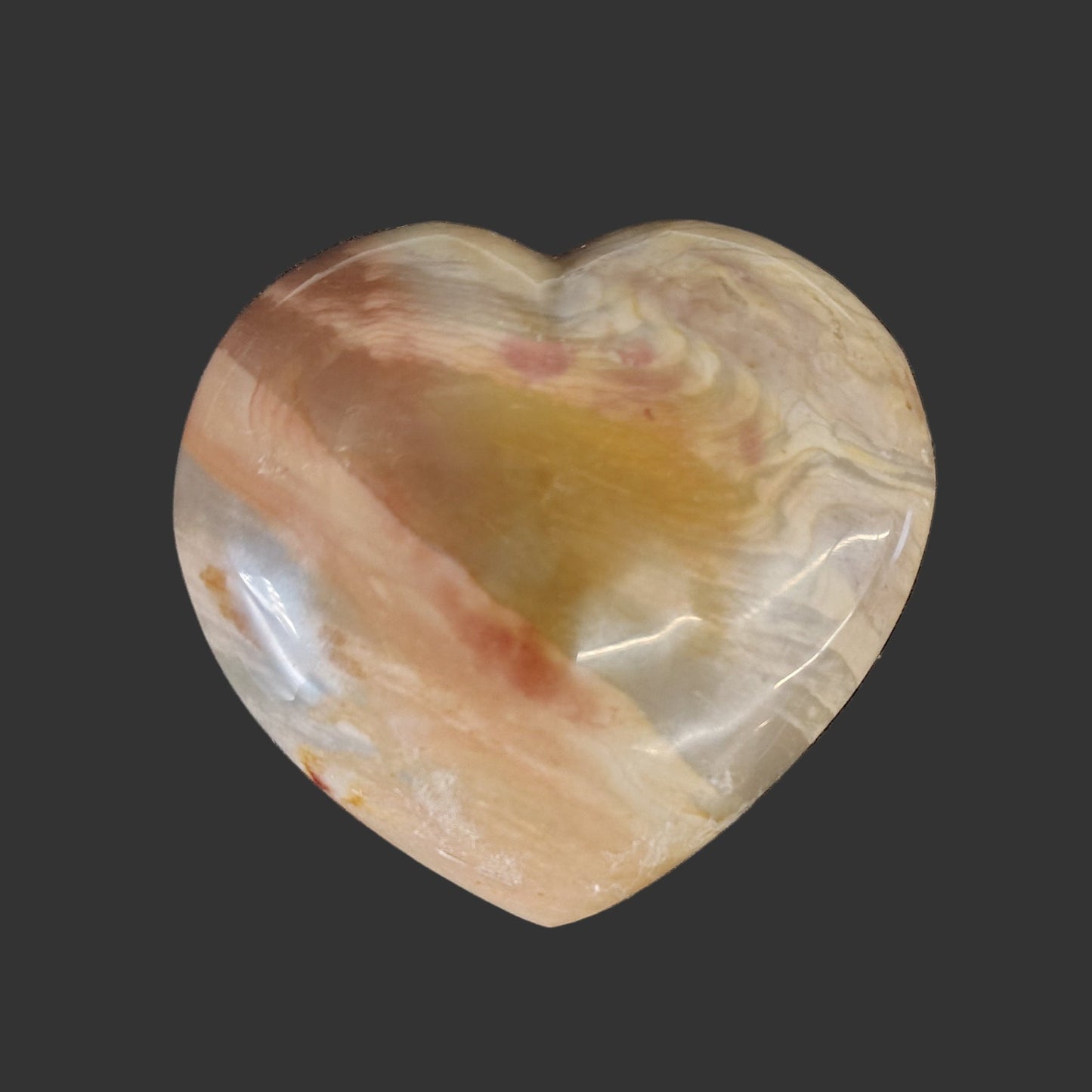 This is the back side of this polished polychrome jasper heart