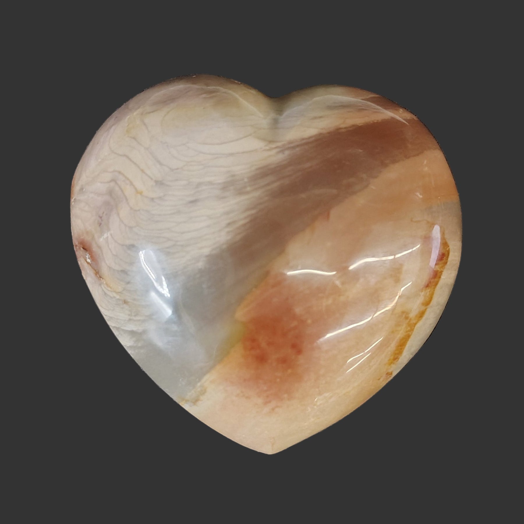 This is the front side of this polished polychrome jasper heart