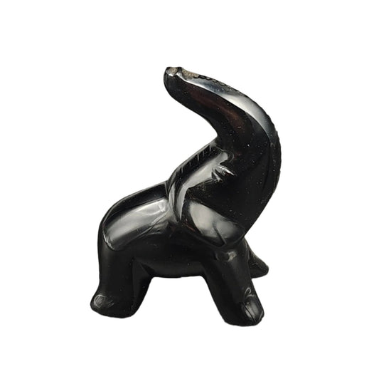 This is the right side of this Obsidian elephant figurine