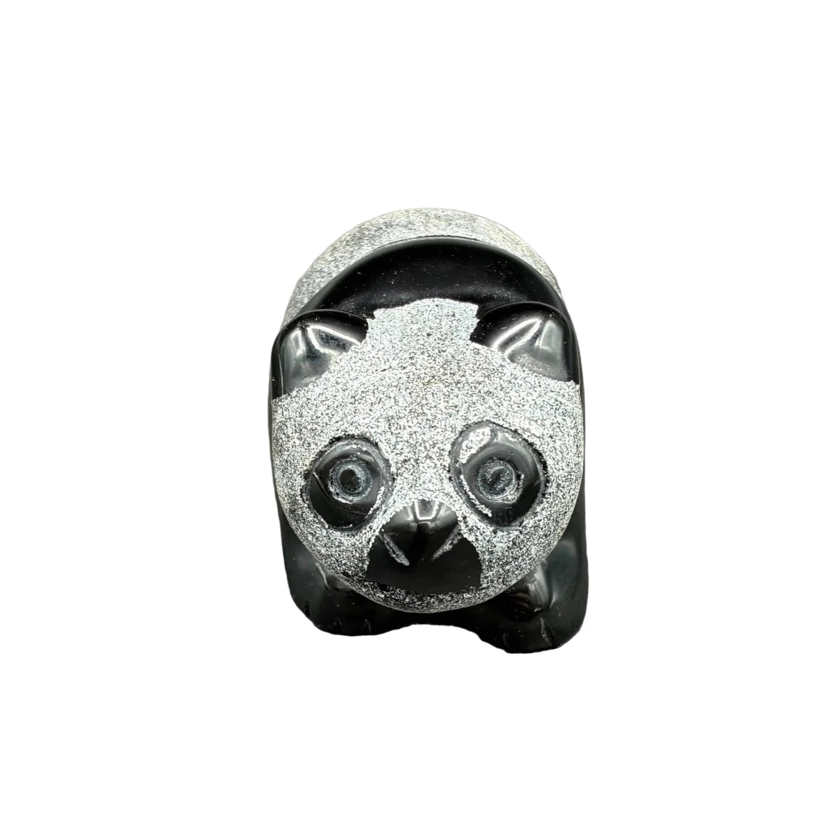 Front side of this obsidian panda in front of a white background.