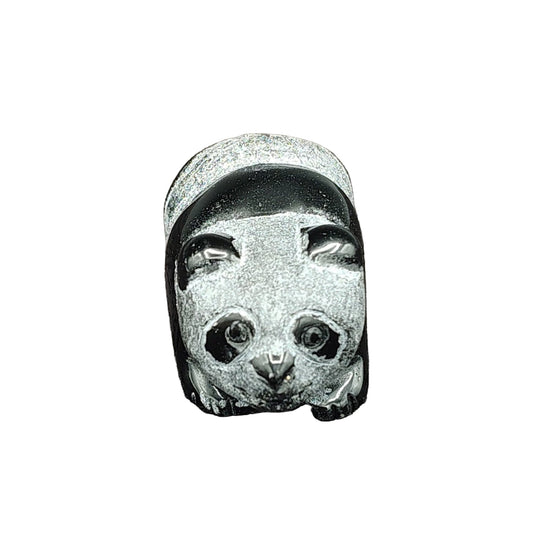 This is the front view of this obsidian panda bear figurine