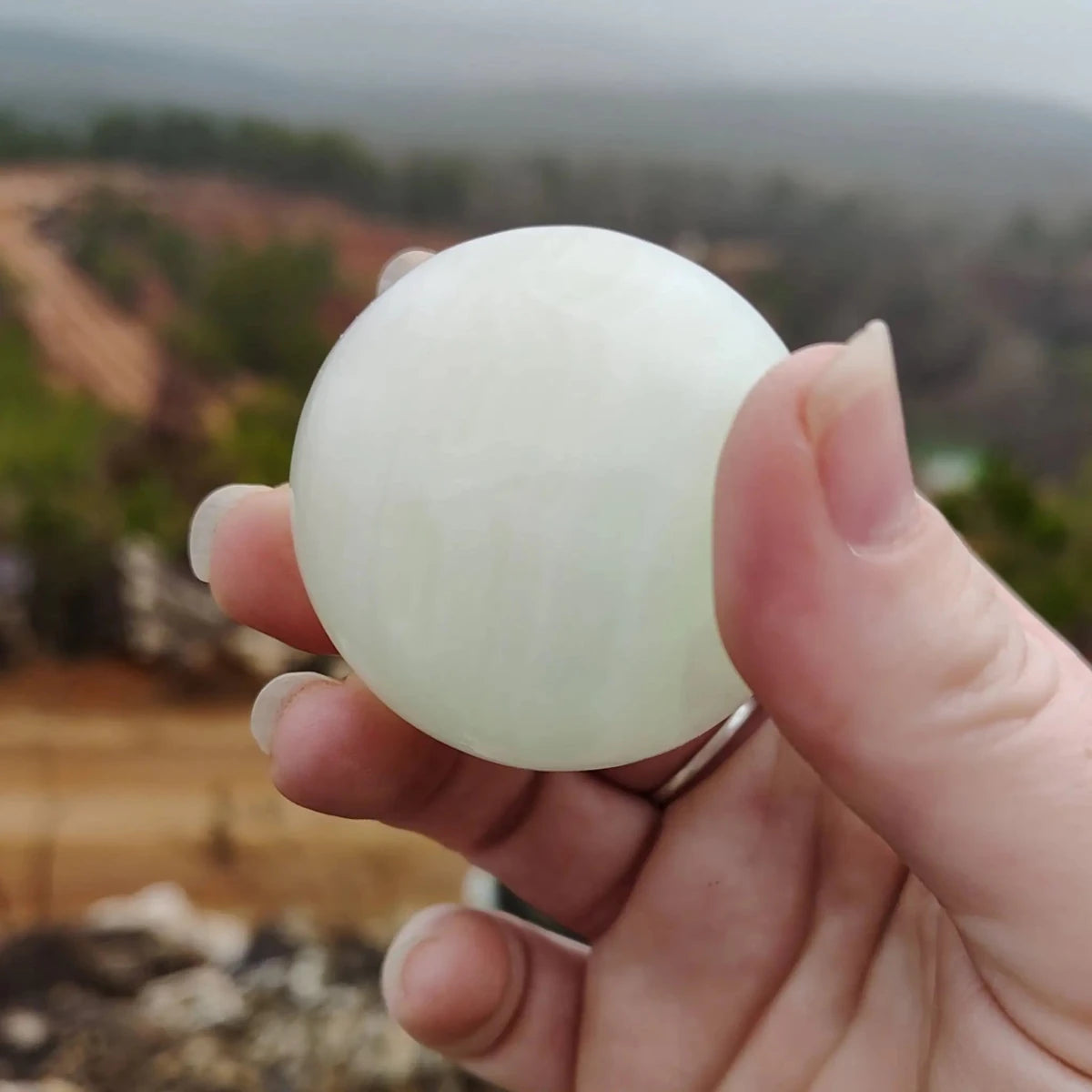 This is another view of this green Calcite sphere