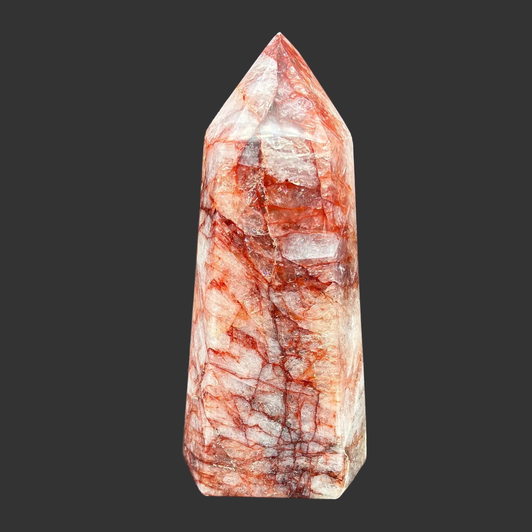 This is the front side of this polished red and white Hematoid tower.
