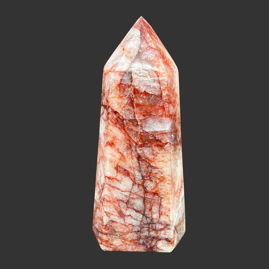 This is the front side of this polished red and white Hematoid tower.