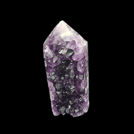 This is the front side of this polished purple Amethyst point 