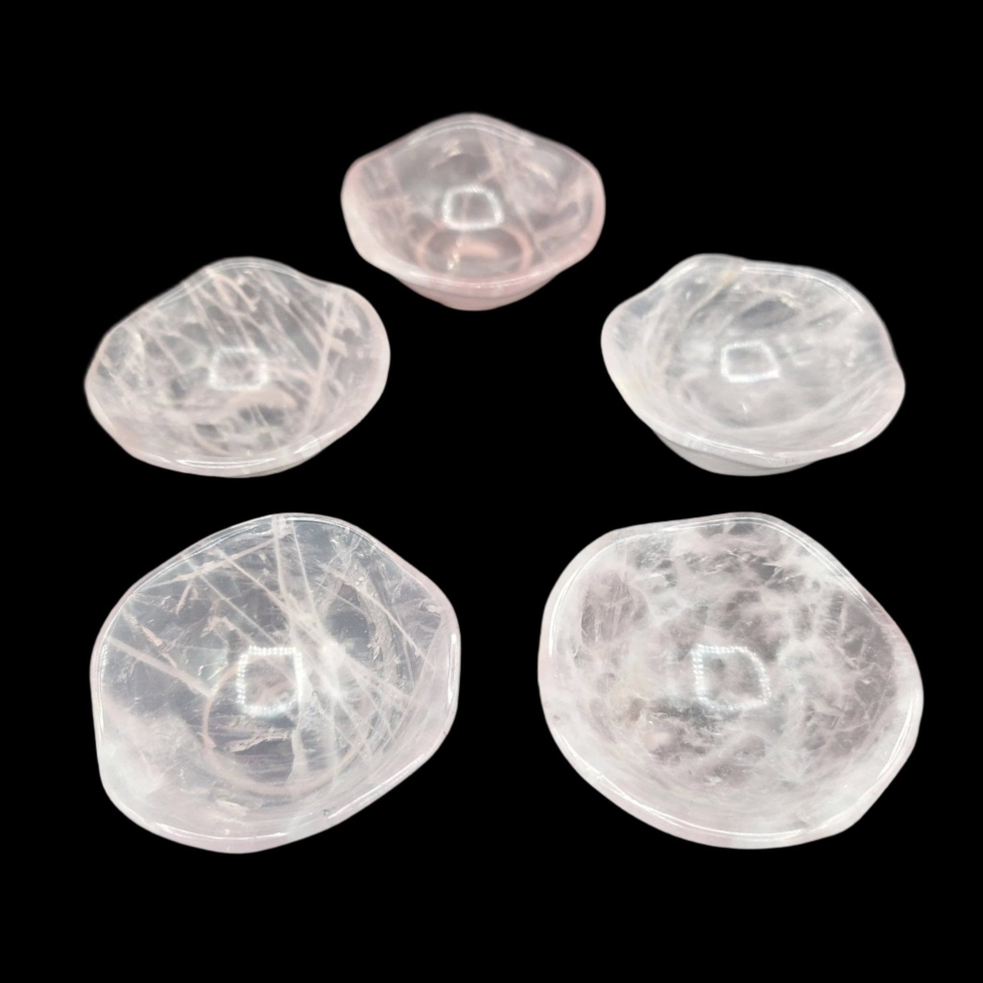 Polished Rose Quartz teacups, there is 5 of them included with the tea pot