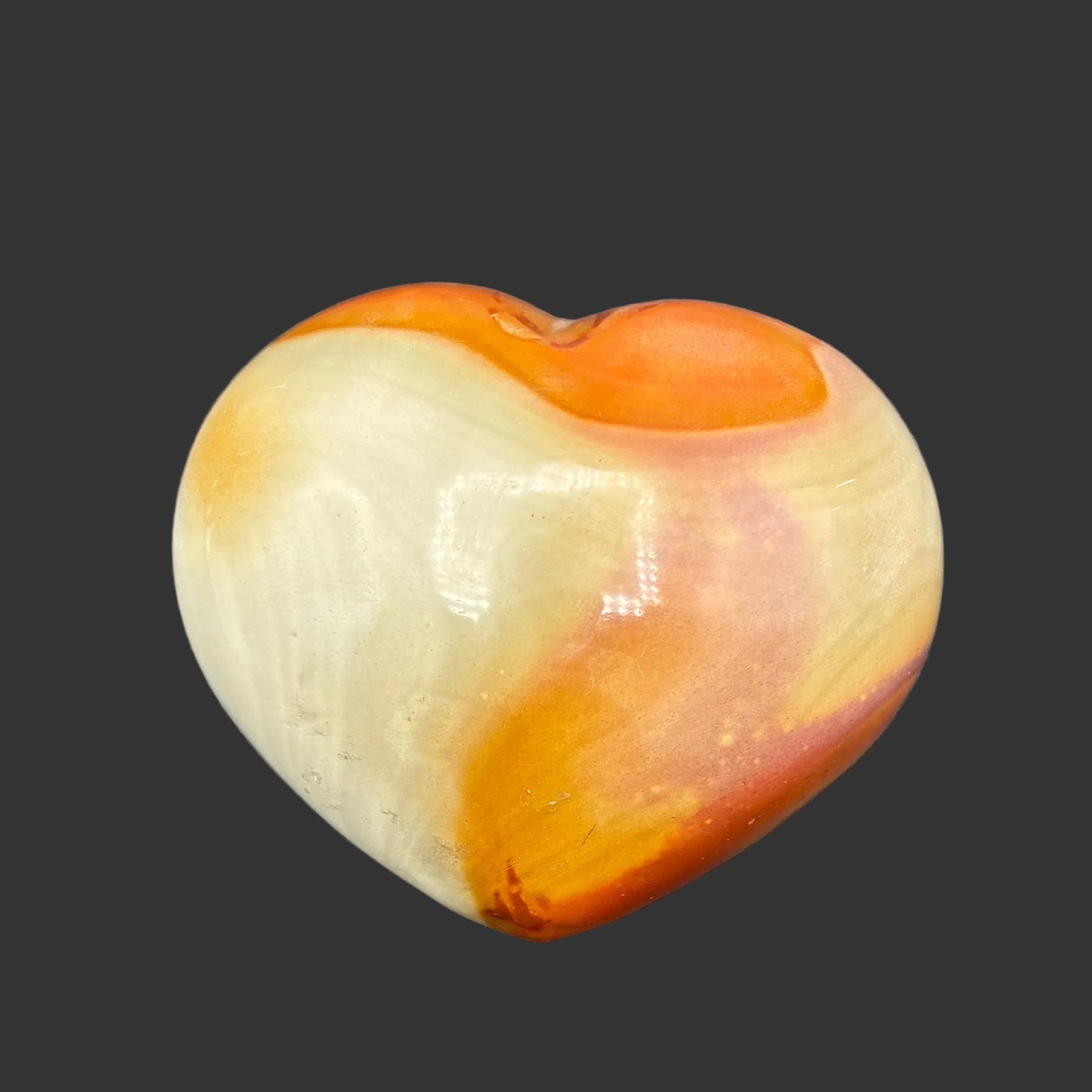 This is the back side of this polychrome jasper heart.
