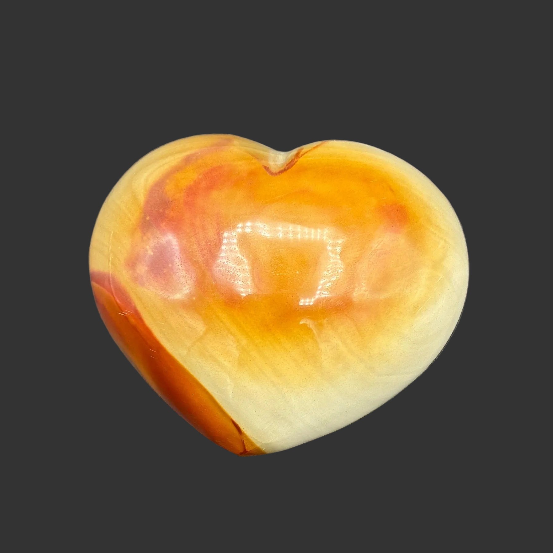 This is the front side of this polished polychrome jasper heart.