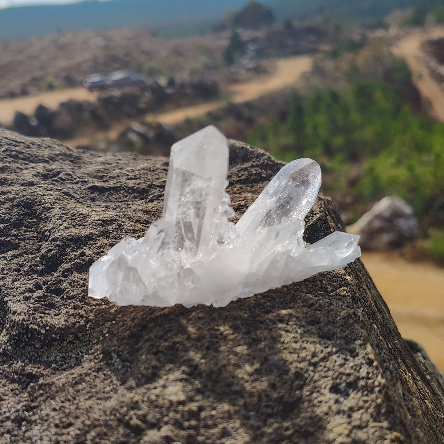 Back side of this pristine quartz crystal cluster outside in nature.